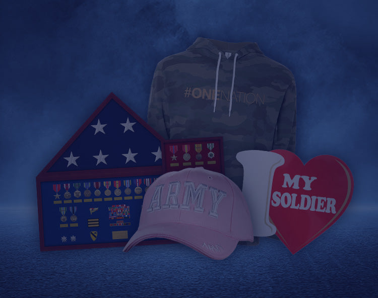 Military memorabilia display with cap, hoodie, flag, medals, heart-shaped sign saying "My Soldier."