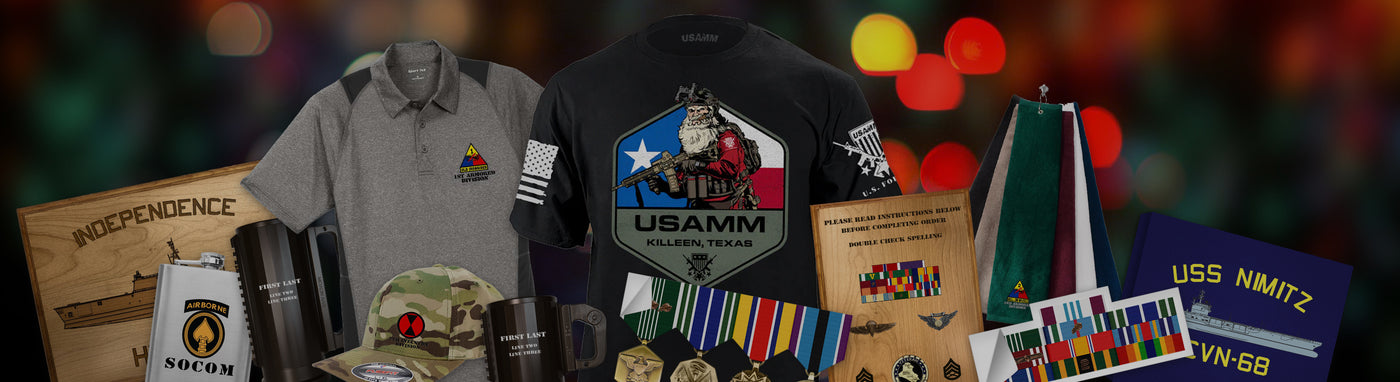Assorted USAMM memorabilia featuring Patriotic Shirts & Apparel, plaques, and military honors on display.