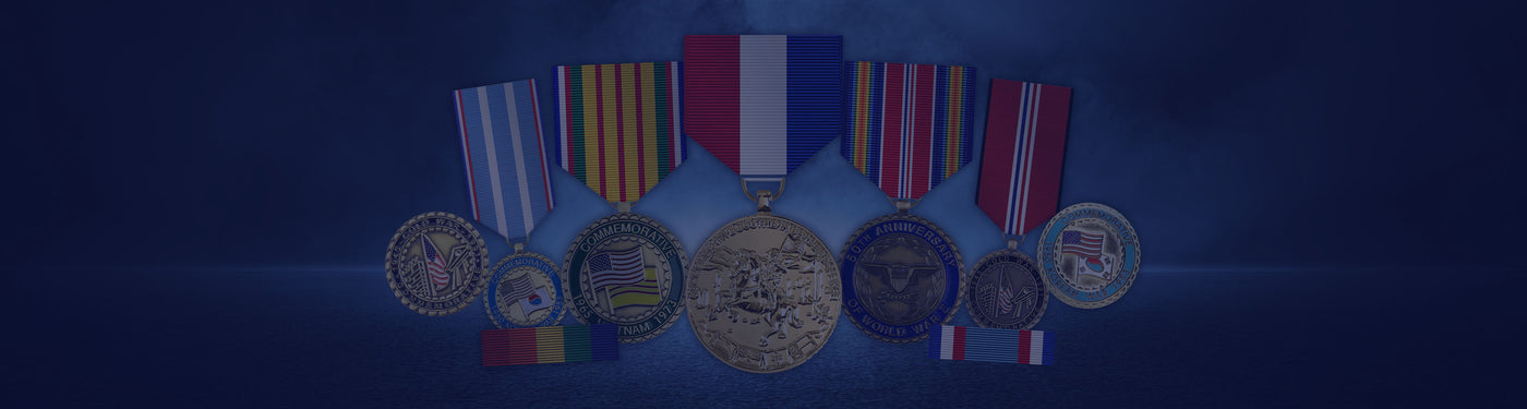 Assortment of military medals displayed in a row against a deep blue background.