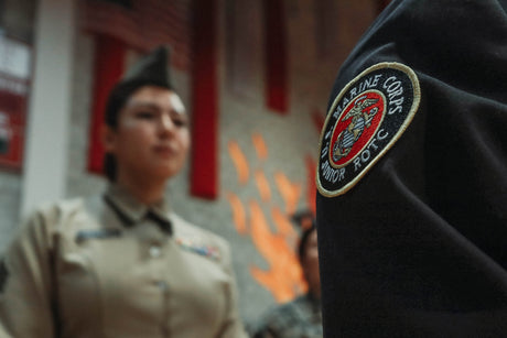 A Marine JROTC cadet participates in an inspection.