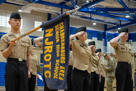 NJROTC cadets stand in formation.