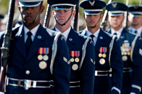 Airmen in a color guard for Veterans Day