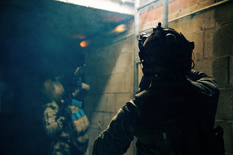Special operations soldiers clear a building.