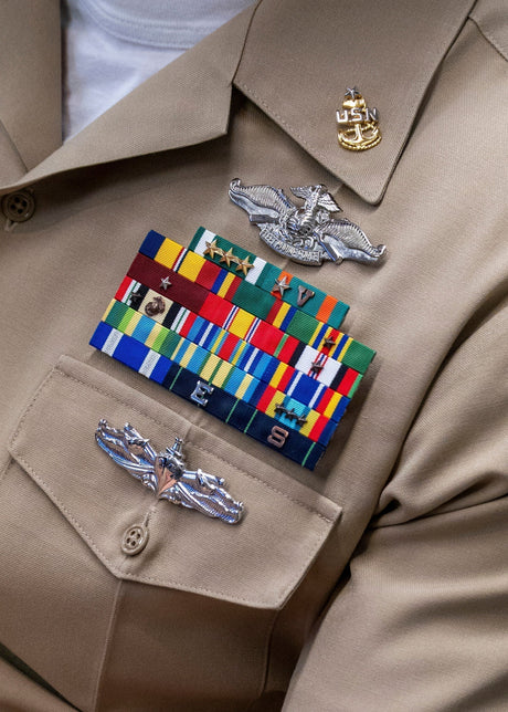 A thin ribbon rack on a Navy uniform.