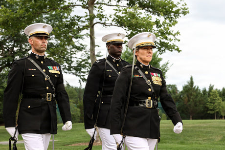 Marine officers participate in a ceremony.